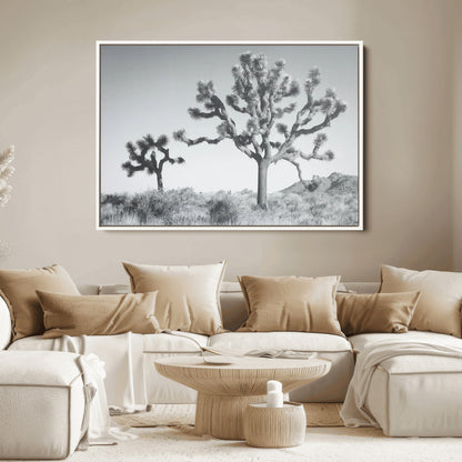 Black and white Joshua tree in a desert landscape with soft light and dry brush, perfect for rustic or minimalist home decor.