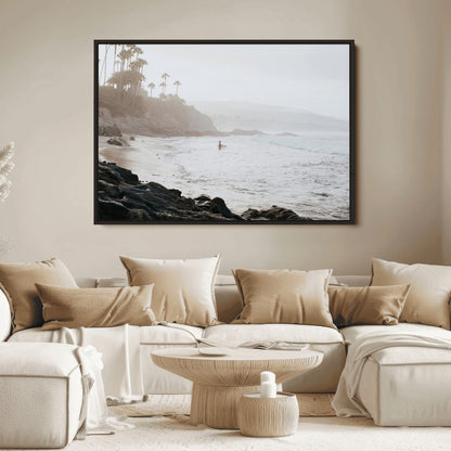 Framed canvas of a surfer in misty coastal tones at a foggy California beach, ideal for minimalist coastal beach or serene ocean-themed decor.
