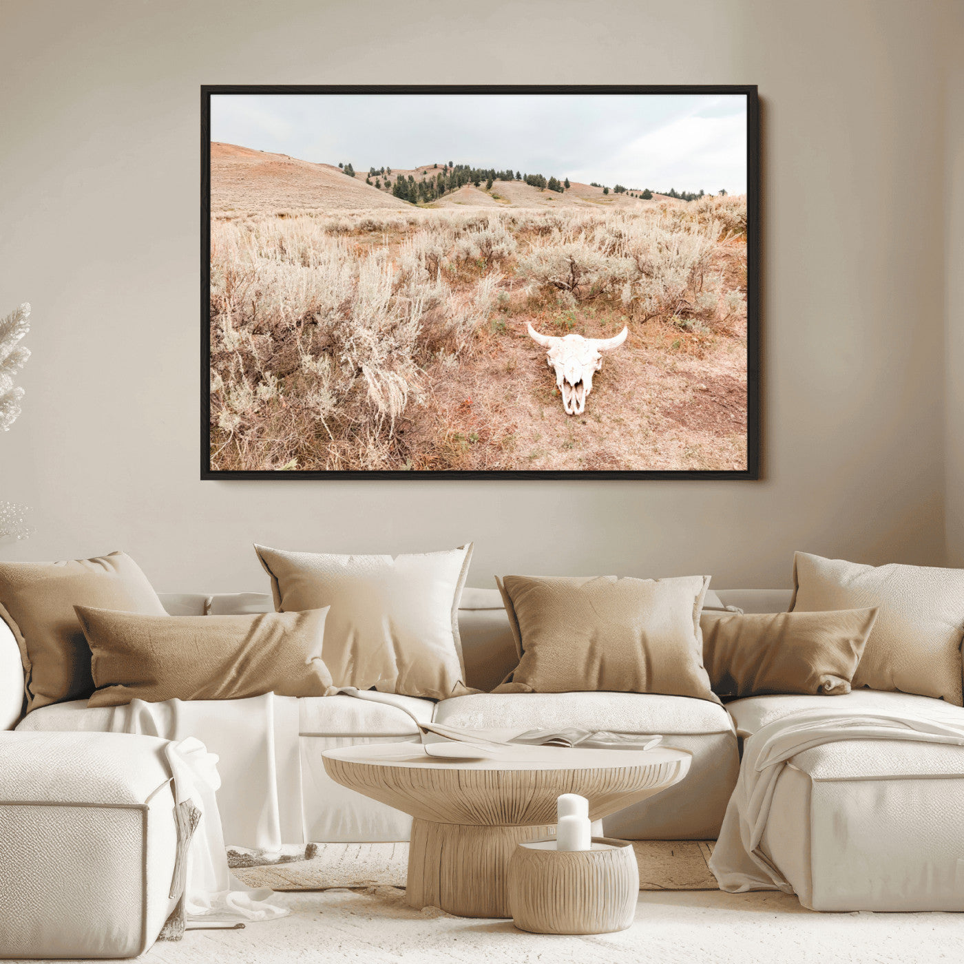 Rustic bull skull on dry sagebrush field under soft light, ideal for western minimal or desert prairie-style wall decoration.