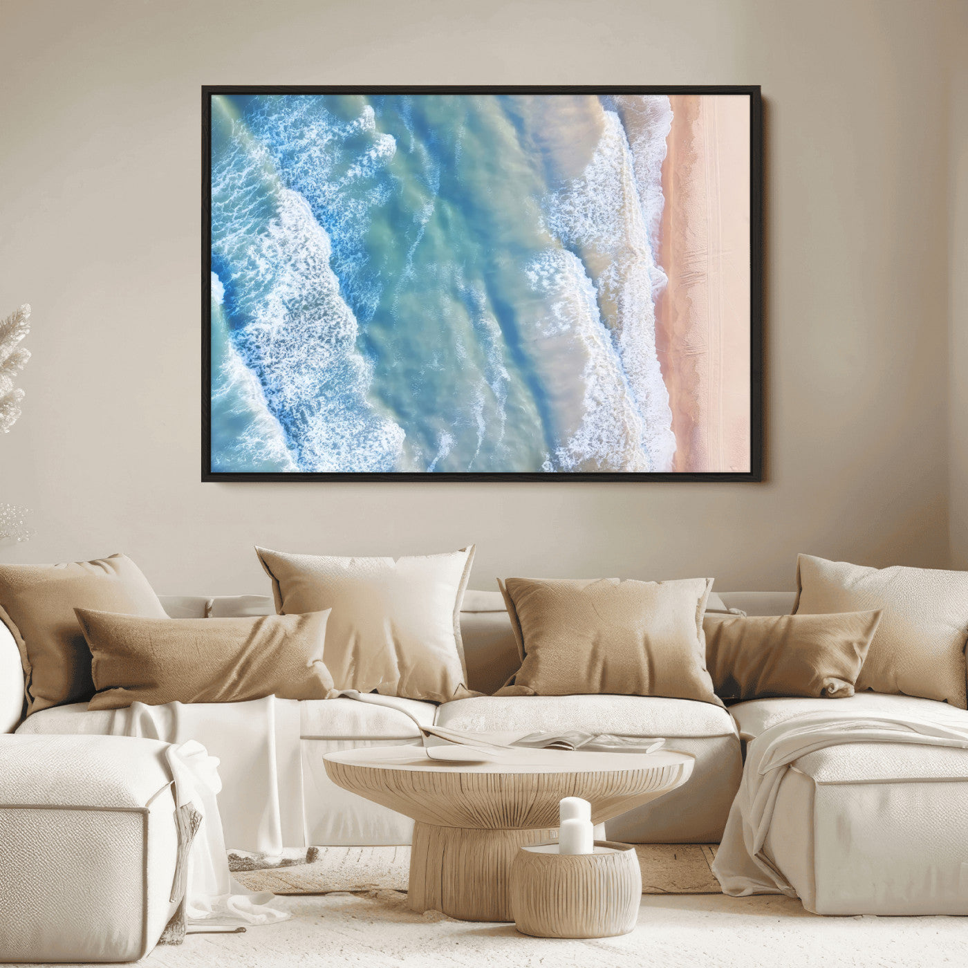 Aerial photo of soft blue waves meeting sandy shore, perfect for modern coastal or beach-themed decor with a light and tranquil aesthetic.