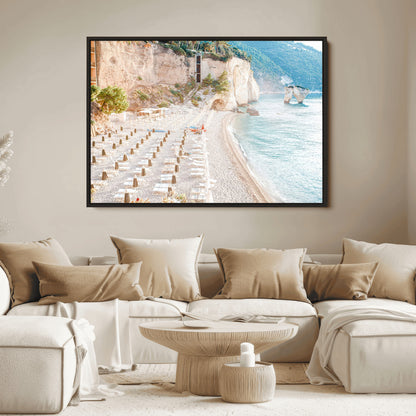 Wall art of a calm Mediterranean beach with rows of sun loungers and umbrellas in soft pastel tones, perfect for light coastal or vacation-themed decor.