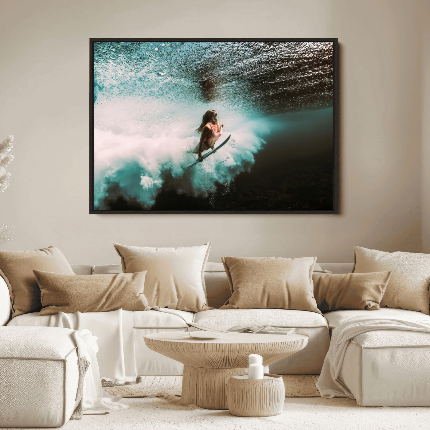 Vibrant underwater photo of a female surfer diving through turquoise waves, perfect for coastal boho or surf-inspired home decor.