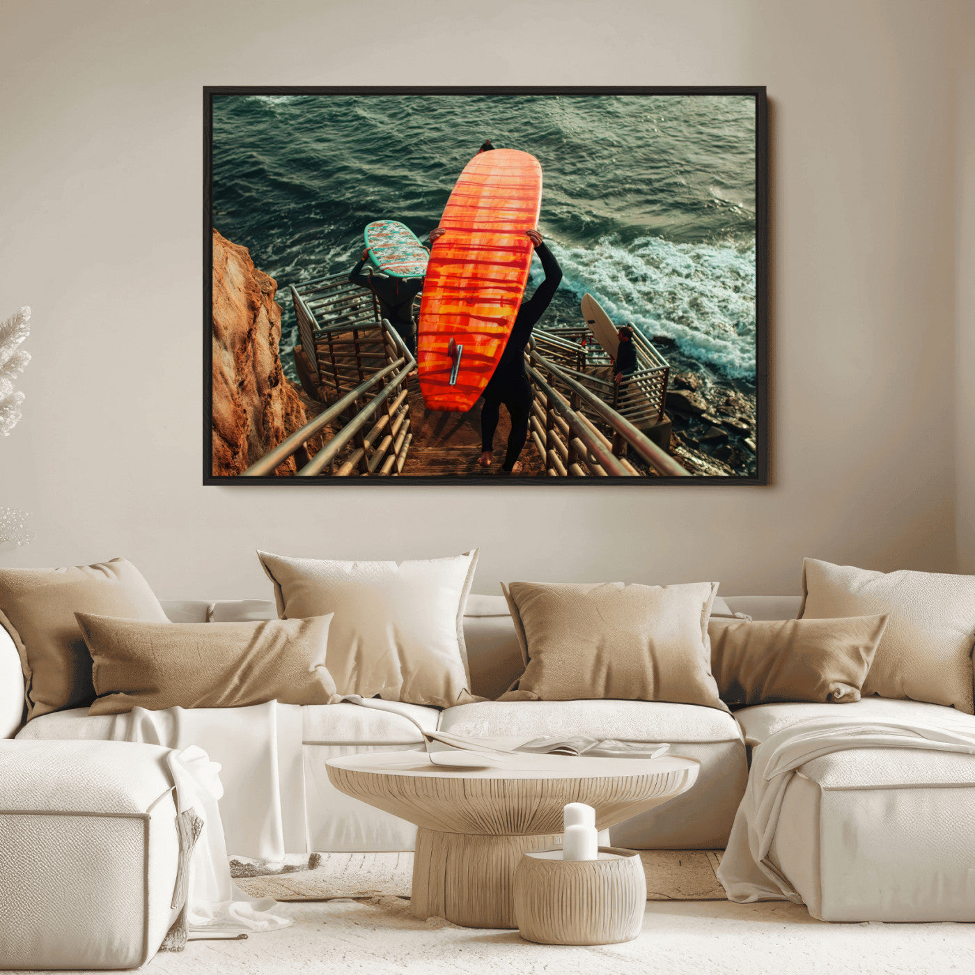 A surfer carrying a bold orange surfboard down a rugged staircase toward the ocean, bathed in golden hour light, capturing the energy of coastal adventure.