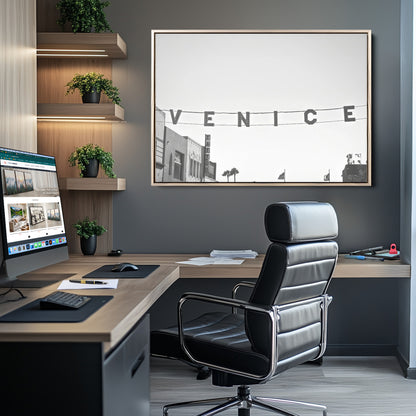 Black and white photo of Venice Beach sign and palm-lined street, perfect for urban coastal or minimalist LA-inspired wall decoration.