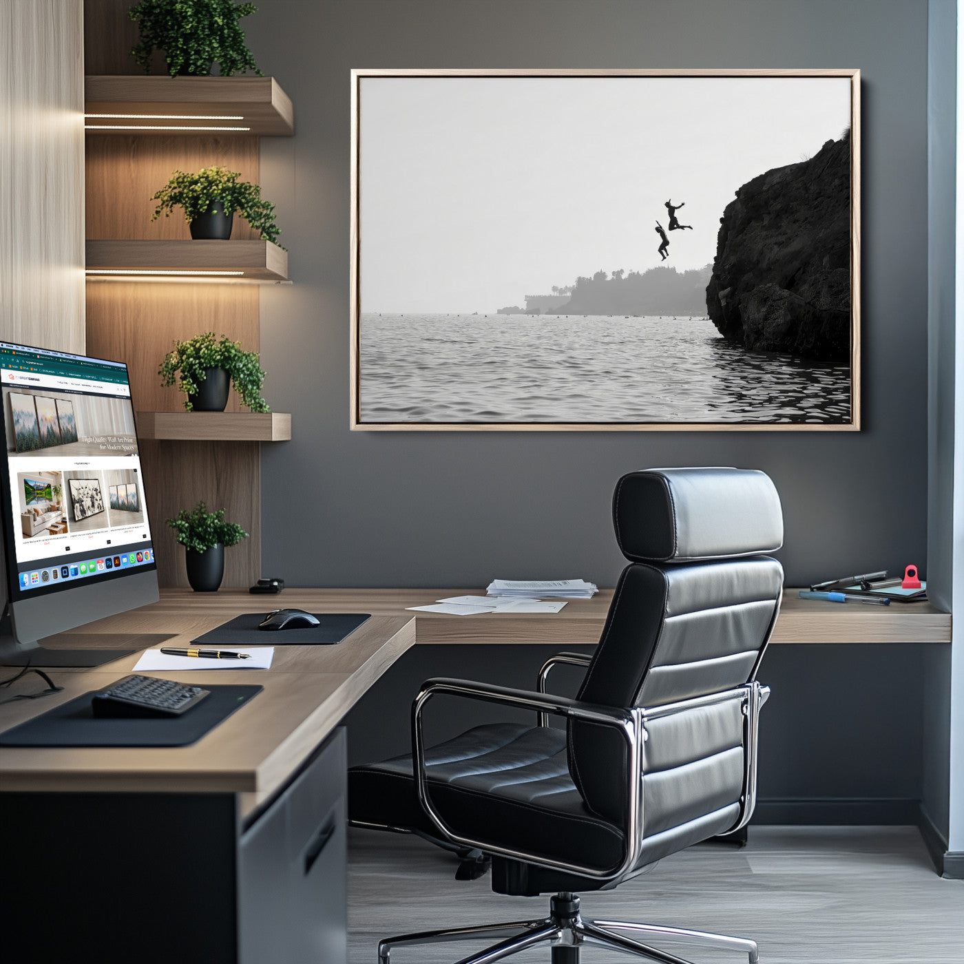 Black and white canvas of two figures cliff jumping into the sea, captured with moody tones, ideal for modern coastal or adventure-themed home decor.   2/2