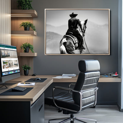 Black and white canvas of a cowboy on horseback with moody tones, perfect for rustic western or country-inspired home decor.