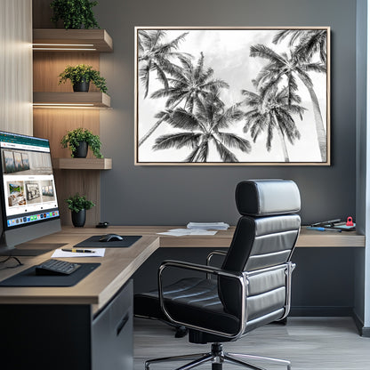 Black and white tropical palm trees viewed from below, swaying gently against a bright sky, creating a serene and elegant coastal atmosphere.