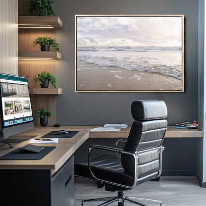 Peaceful ocean waves rolling onto the sandy shore under soft light, perfect for neutral or coastal minimalist decor themes.