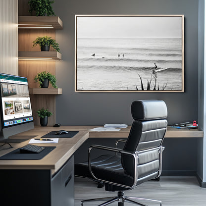 Monochrome canvas of surfers on calm ocean waves, ideal for minimalist coastal or beach-inspired interior decor.