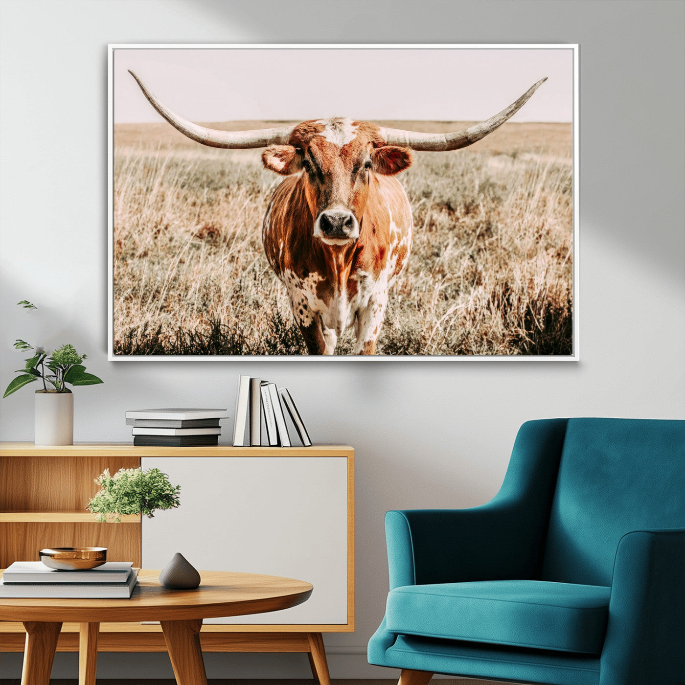 Framed longhorn cow canvas wall art with rustic prairie background, western animal print perfect for farmhouse or ranch style decor