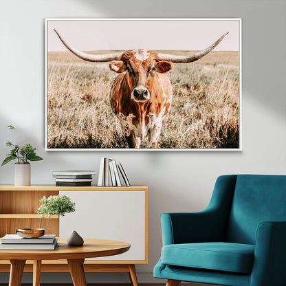 Framed longhorn cow canvas wall art with rustic prairie background, western animal print perfect for farmhouse or ranch style decor