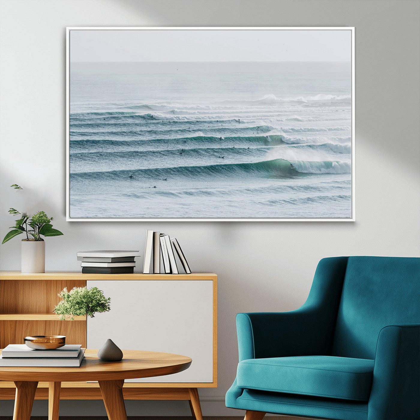 High-angle view of surfers lining up across layered ocean waves, ideal for minimal coastal or surf-inspired room decor.