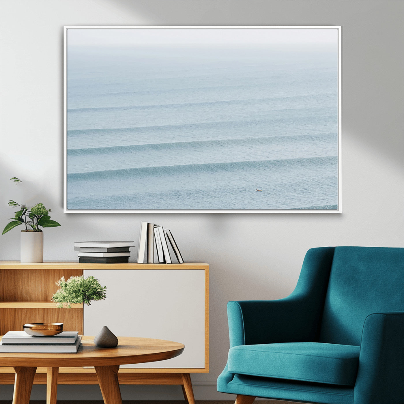 Framed canvas of repeating ocean waves with a distant solo surfer, ideal for minimalist ocean or calm coastal wall decor.