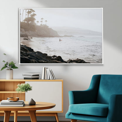 Framed canvas of a surfer in misty coastal tones at a foggy California beach, ideal for minimalist coastal beach or serene ocean-themed decor.