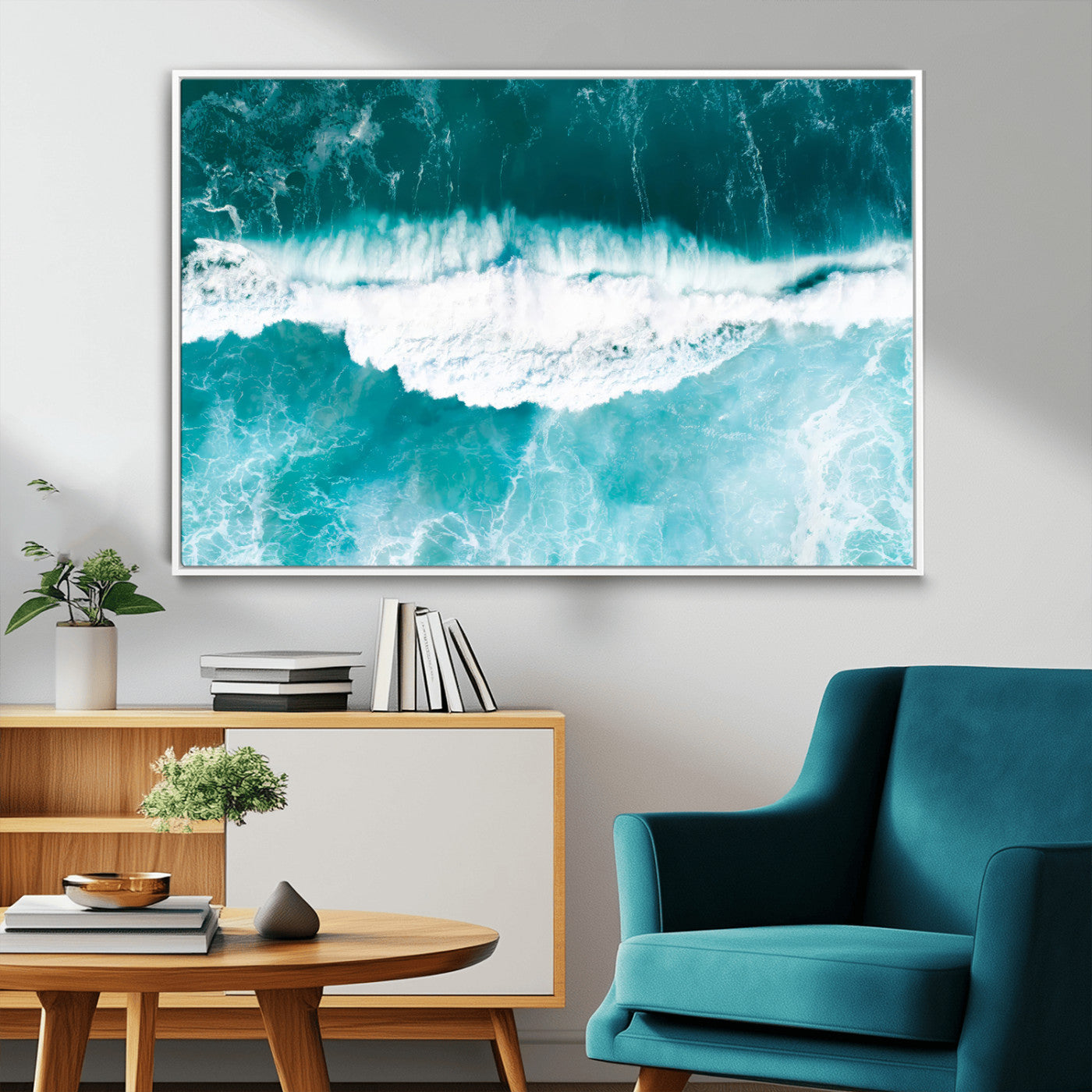 Aerial view of turquoise ocean waves crashing with white foam, perfect for tropical coastal or modern beach-style home decor.