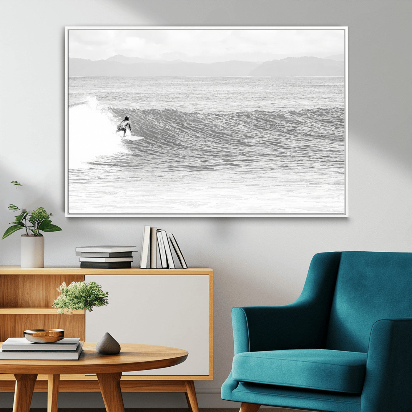 Monochrome photo of a surfer riding a wave with distant mountains, ideal for coastal motion or black and white surf-themed wall decor.