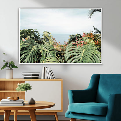 Monstera leaves and tropical flowers framing a calm ocean view, ideal for tropical coastal or exotic jungle-style interior wall decor.