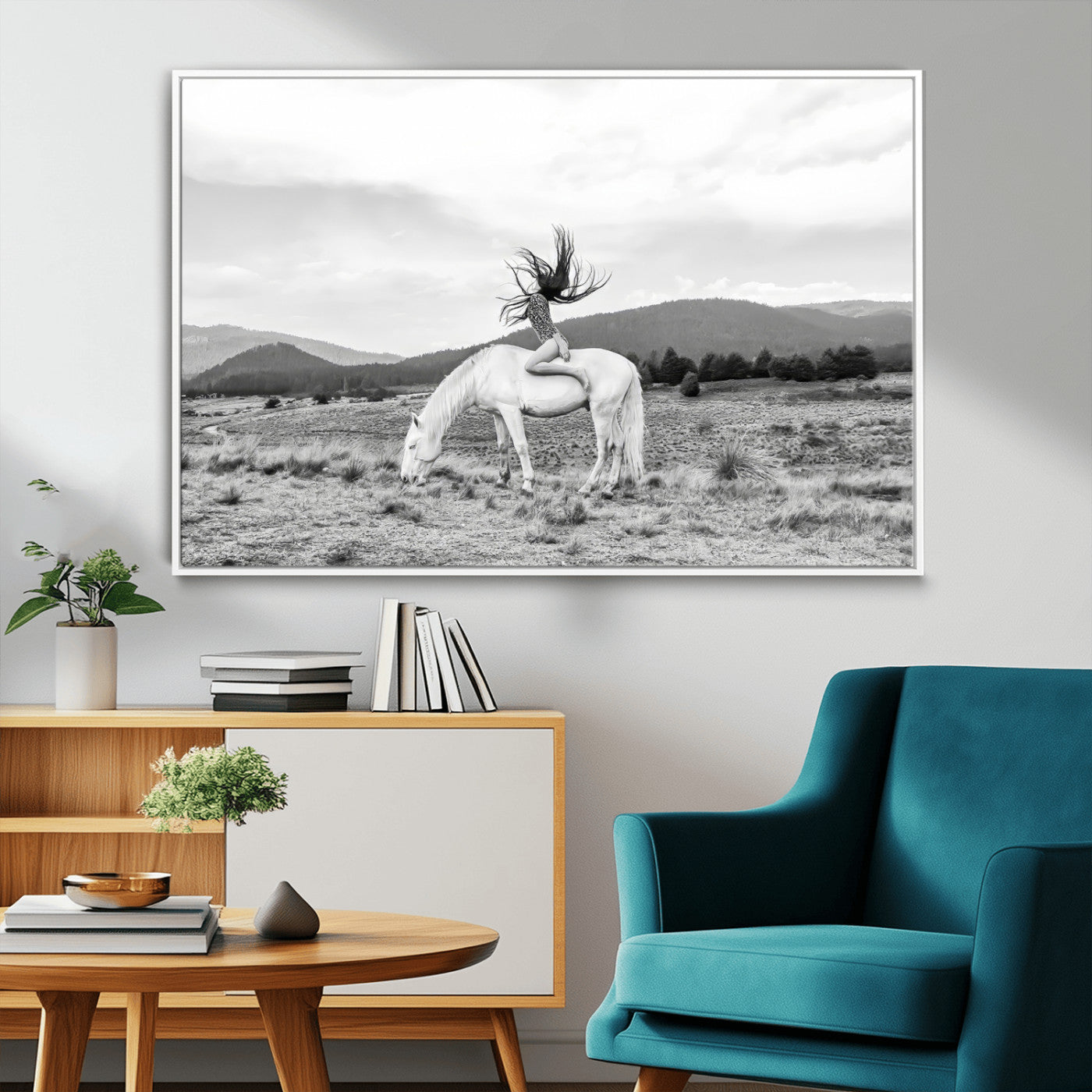 Black and white photo of a woman on a white horse in moody tones, ideal for Western Boho or modern rustic-style home decor.