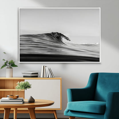 Striking black and white photo of a curling wave, ideal for modern coastal or minimalist wall decor settings.