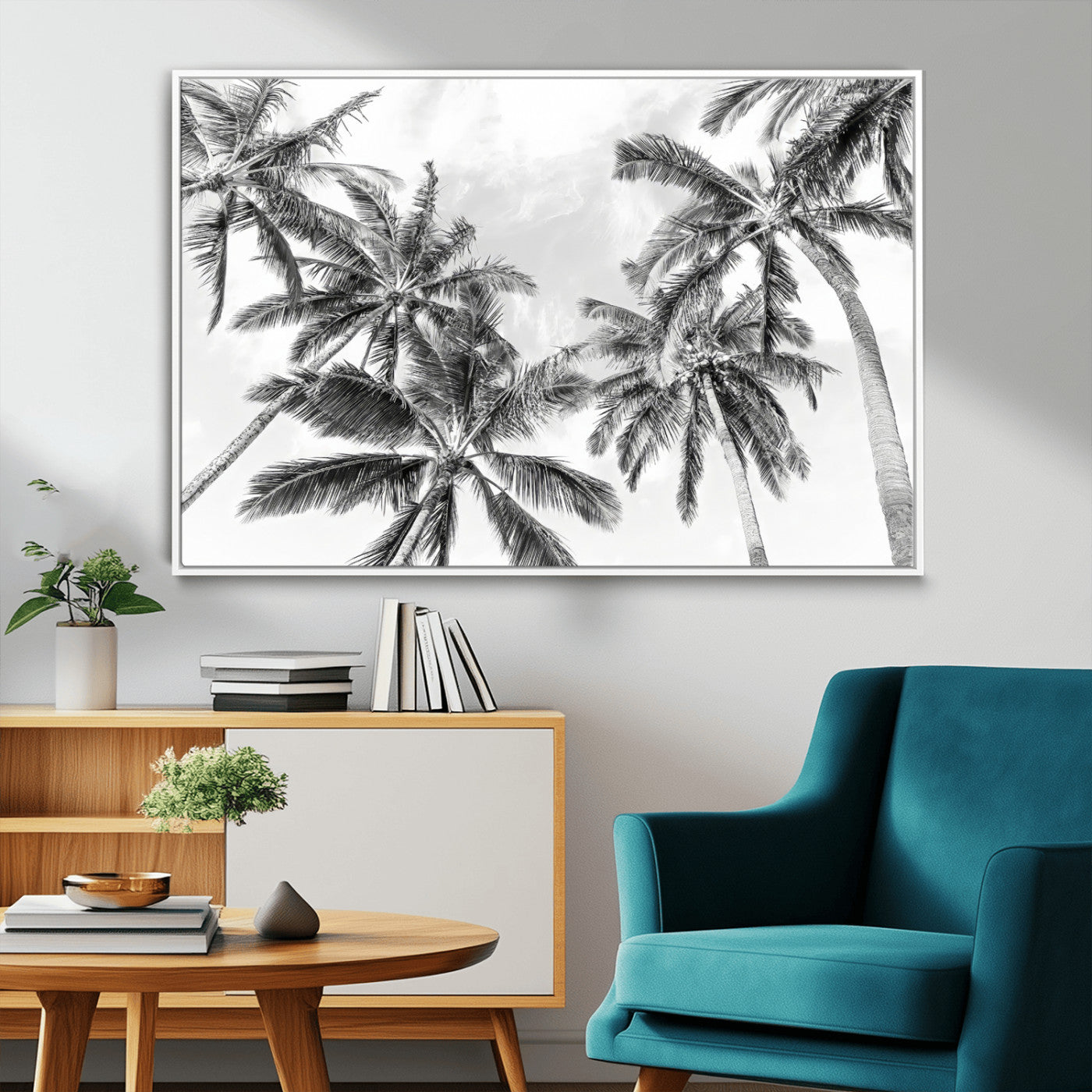 Black and white tropical palm trees viewed from below, swaying gently against a bright sky, creating a serene and elegant coastal atmosphere.