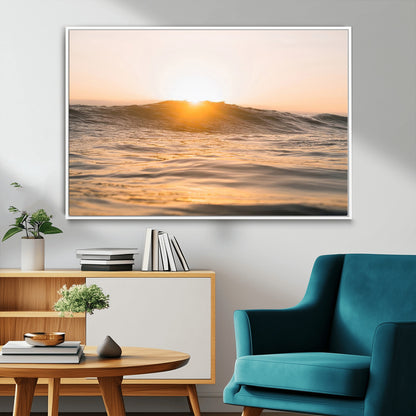 Ocean waves glowing under a warm golden sunset, reflecting soft light and calm movement, perfect for warm minimalist coastal interiors.