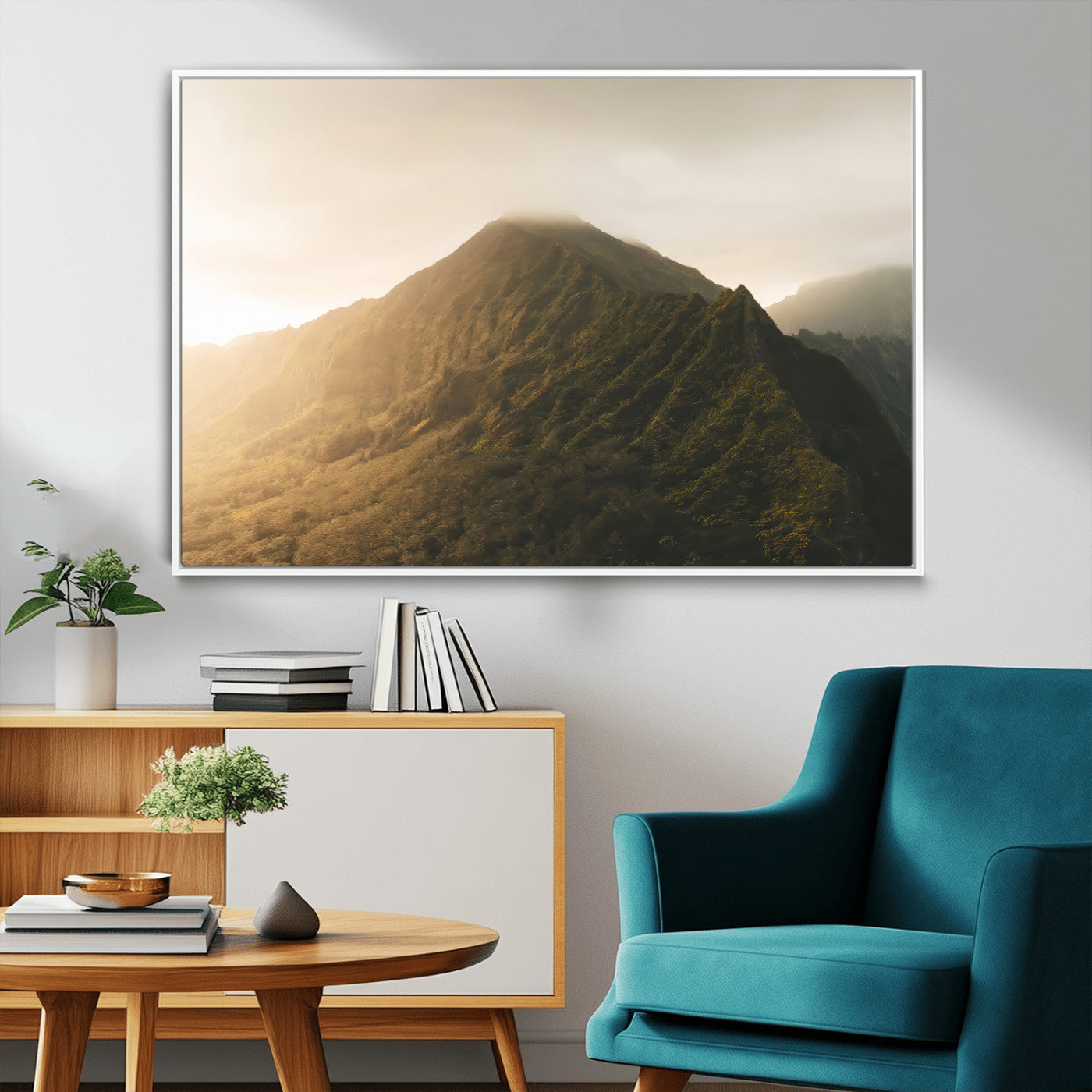 Sunlit mountain peak with mist rolling over its rugged slopes, bathed in golden light, creating a warm and tranquil nature-inspired scene.