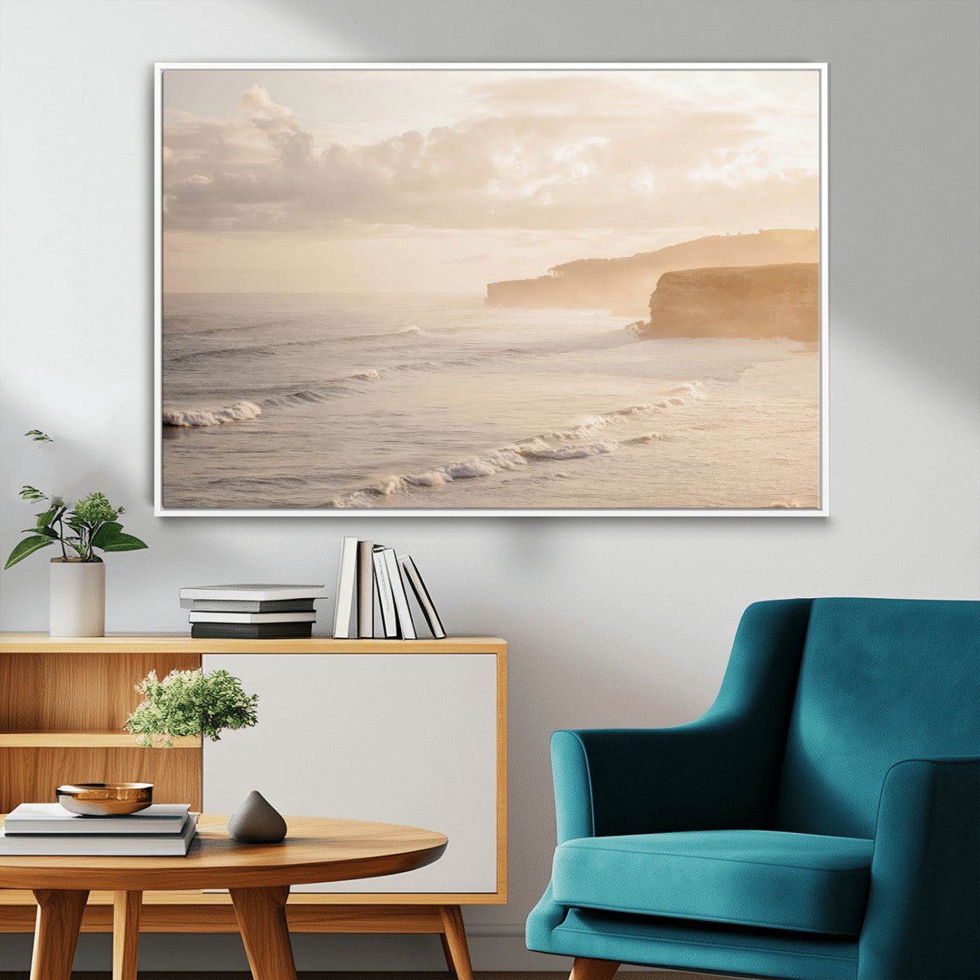 Golden hour seascape with misty cliffs and gentle waves rolling towards the shore, capturing a tranquil and warm coastal atmosphere.