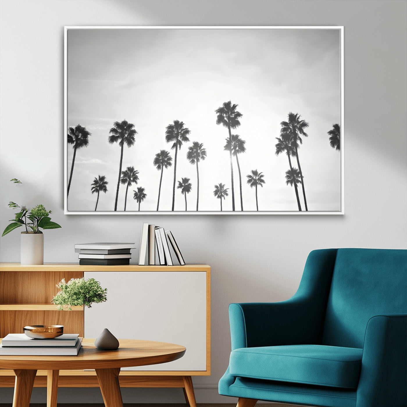 A black and white minimalist scene featuring tall palm trees silhouetted against a bright sky, creating a dreamy and timeless tropical aesthetic.