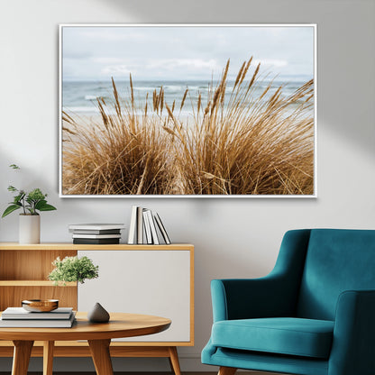 Canvas of golden beach grass swaying by the ocean under a soft cloudy sky, perfect for neutral-toned or coastal minimalist decor.
