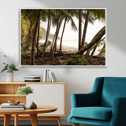 Dense tropical palm trees framing a sandy beach and ocean shore, ideal for jungle or coastal themed interior wall decor.