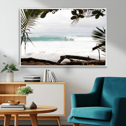 Tropical beach view with palm trees and surfer riding a wave, perfect for boho or coastal-inspired interior wall decor.