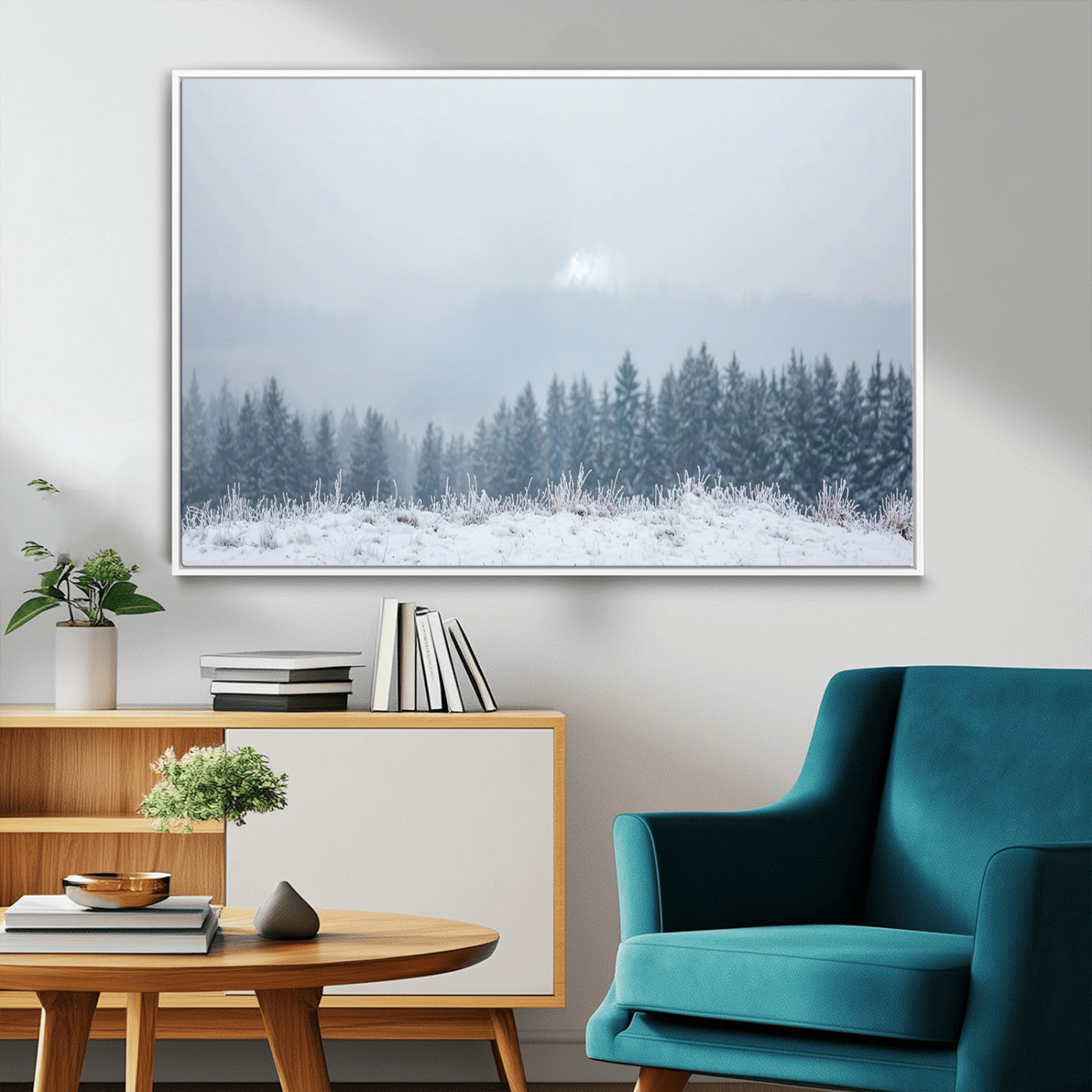Snow-covered forest under misty sky, soft light breaking through clouds, ideal for minimalist or Nordic-inspired home decor.