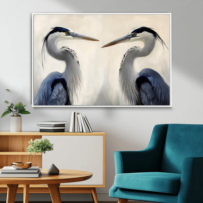 Two blue herons facing each other on a soft neutral background, ideal for coastal, tranquil, or nature-inspired minimalist interiors.