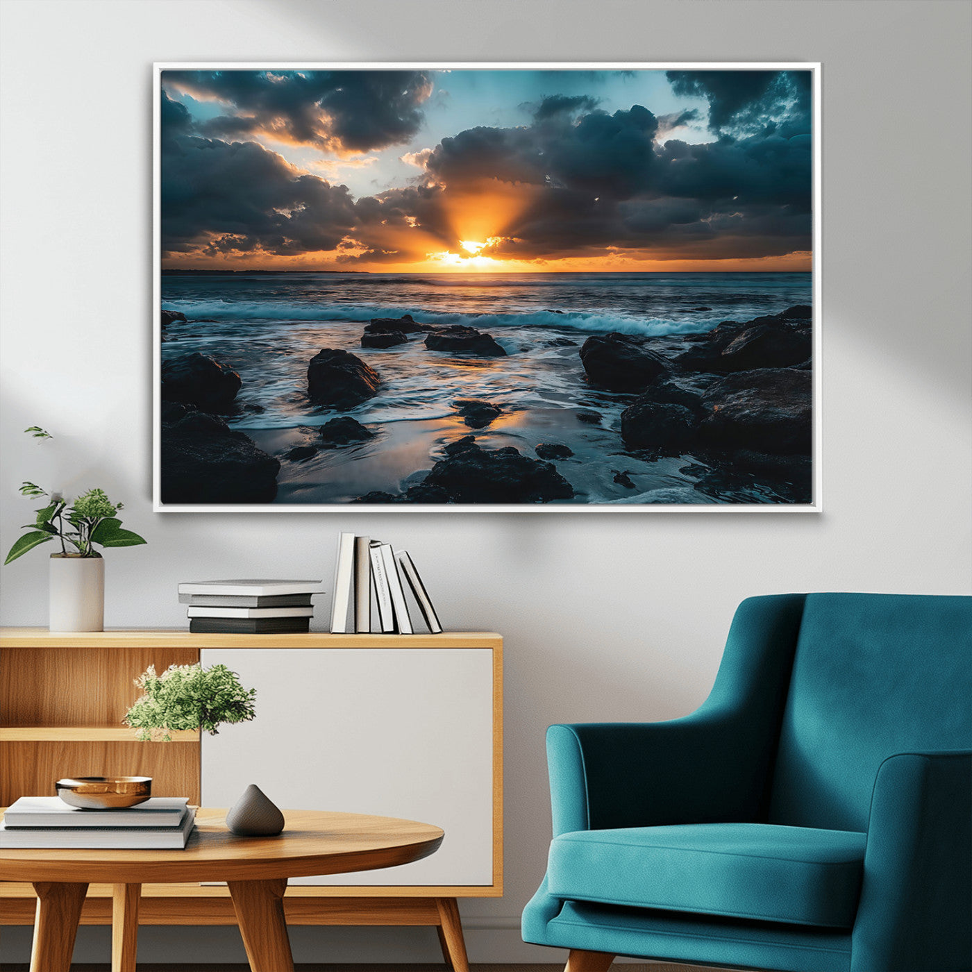 An awe-inspiring sunset over the ocean with rays of light piercing through dramatic clouds, creating a beautiful seascape with rocks in the foreground.