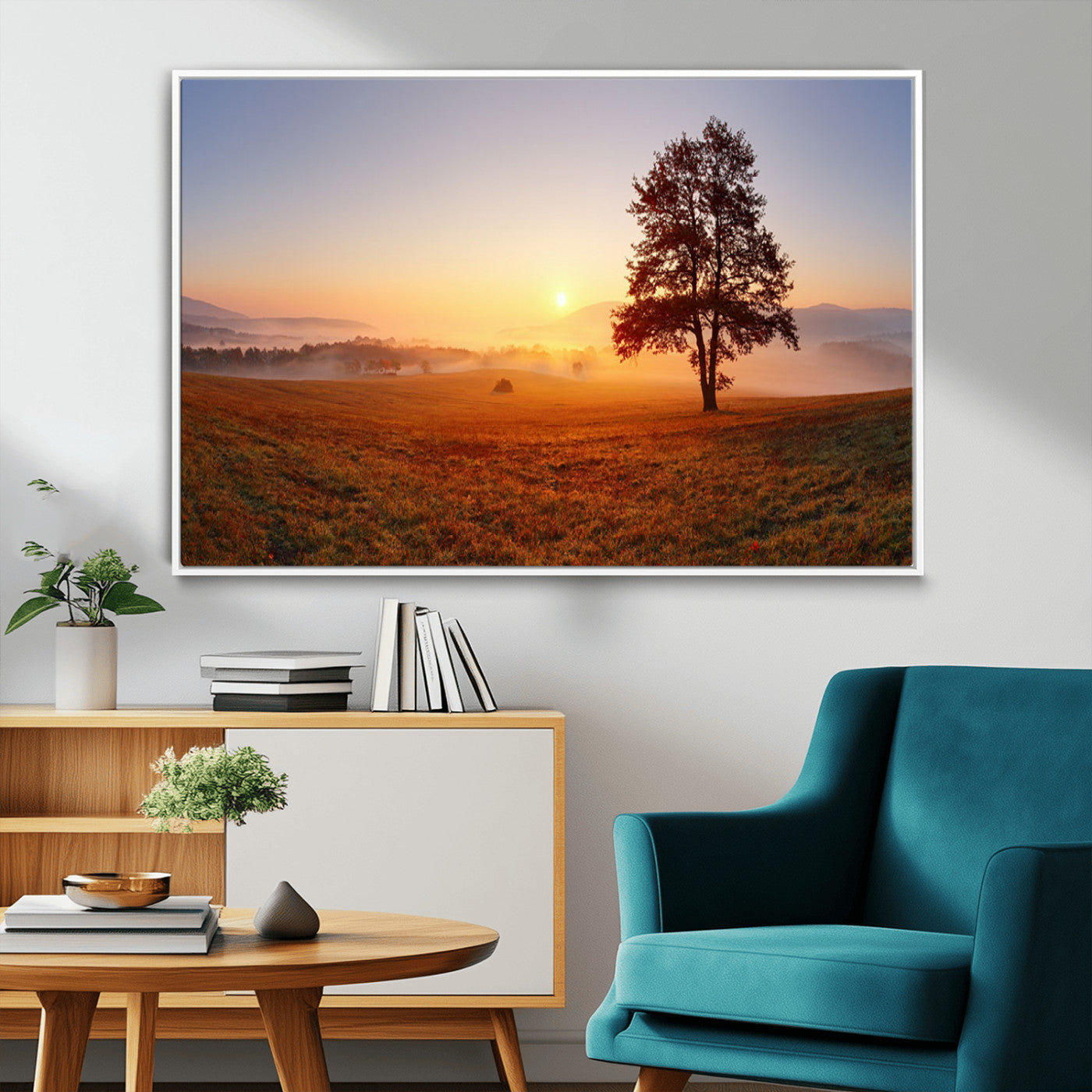 A tranquil landscape at sunrise with a mist-covered field and a lone tree, creating a peaceful and natural atmosphere.