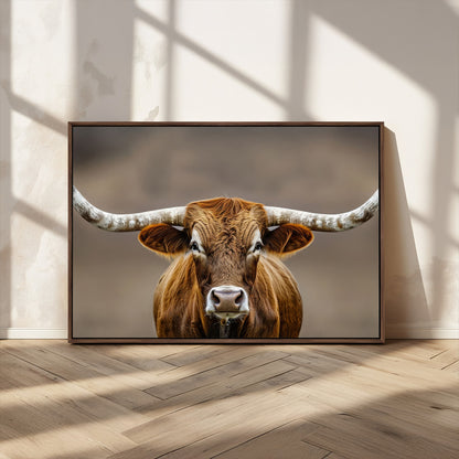 Close-up of a Texas Longhorn with strong curved horns and warm brown tones, perfect for rustic or western-style wall decor.