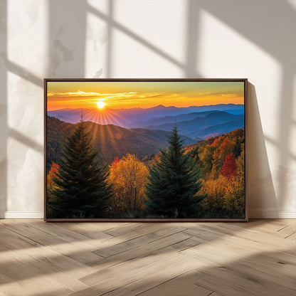 Vibrant sunset over autumn mountains with colorful trees and warm light, ideal for nature lovers or cabin-style wall decor.