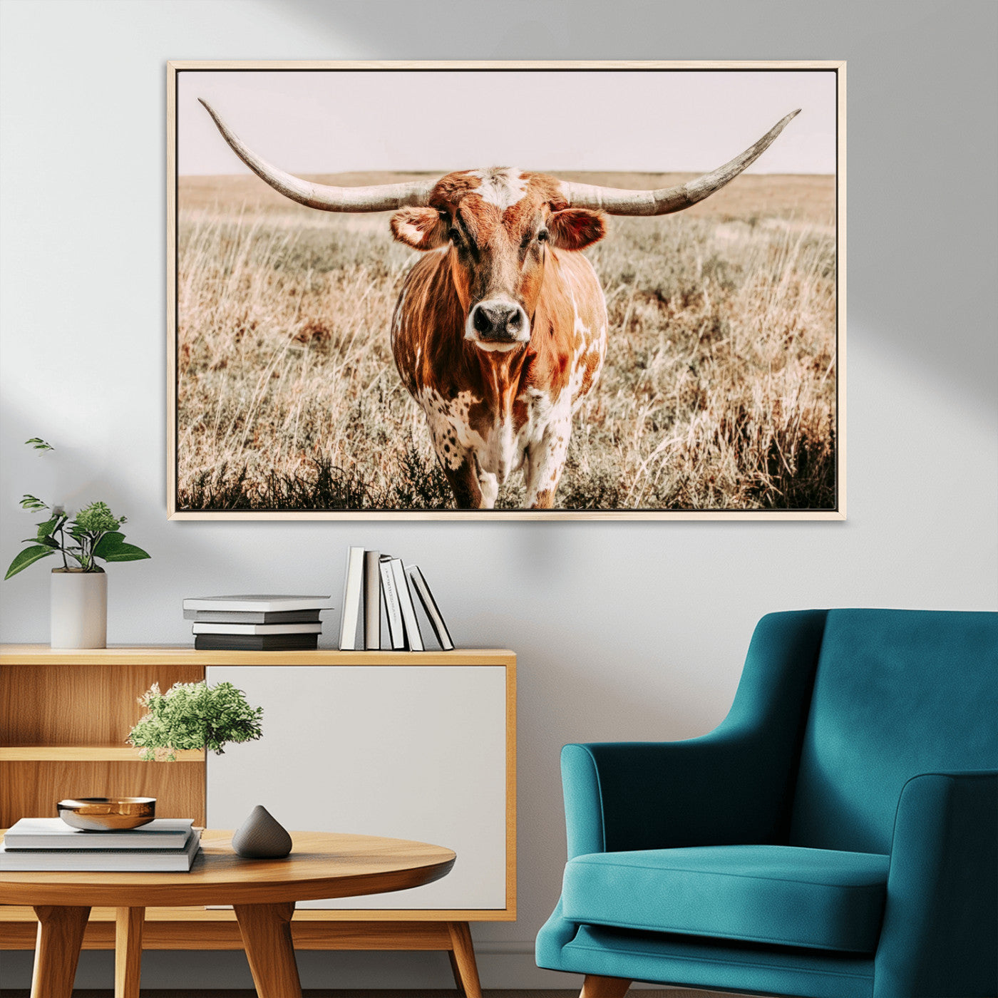 Framed longhorn cow canvas wall art with rustic prairie background, western animal print perfect for farmhouse or ranch style decor