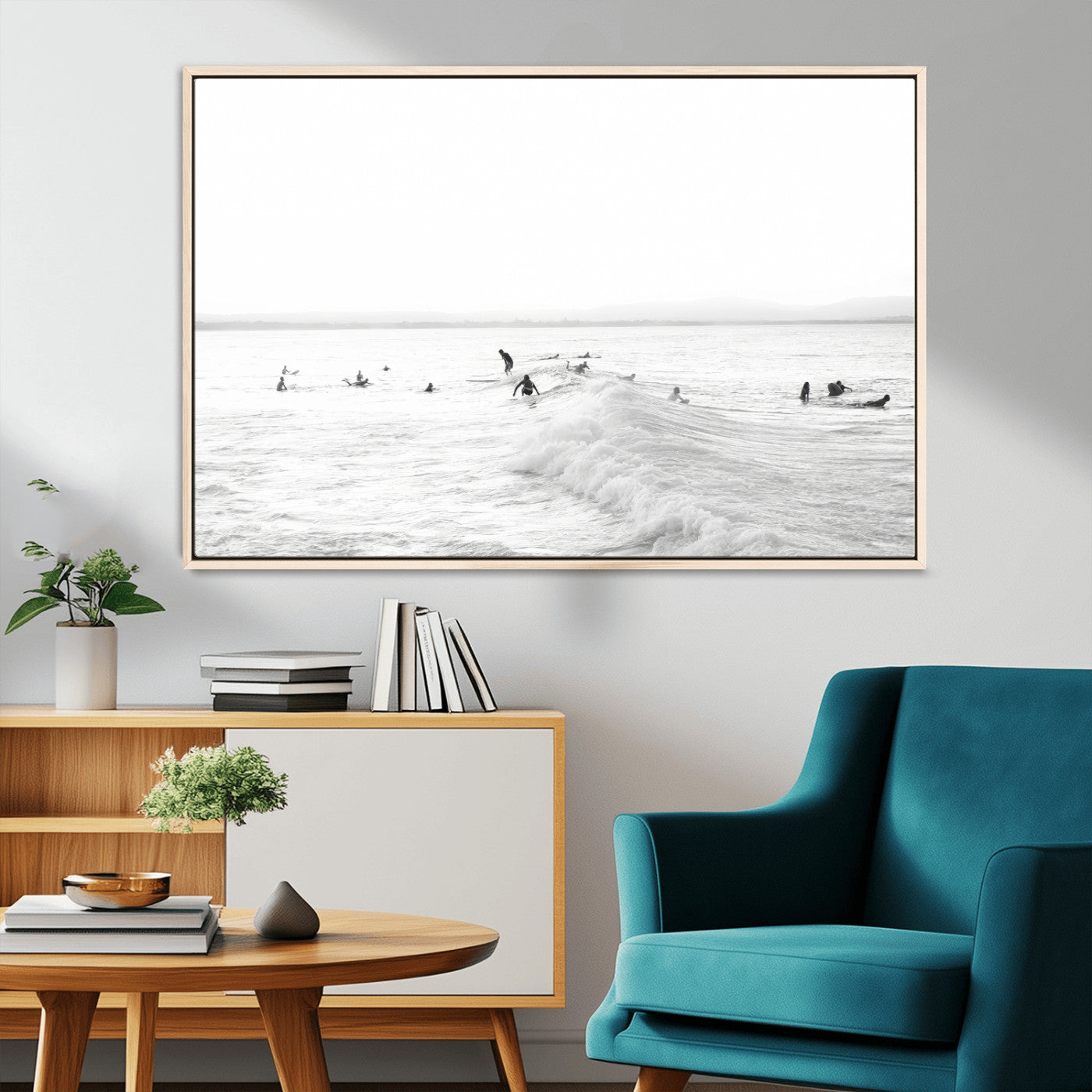Monochrome photo of surfers riding and waiting on ocean waves, ideal for surf-themed or coastal energy wall decor.