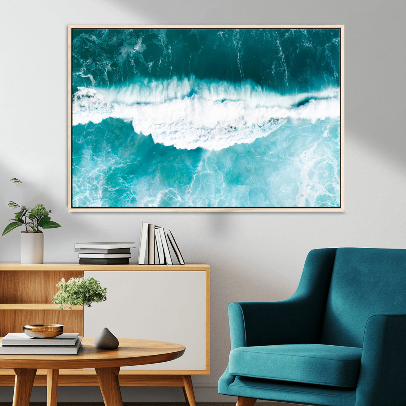 Aerial view of turquoise ocean waves crashing with white foam, perfect for tropical coastal or modern beach-style home decor.