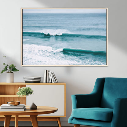 Powerful ocean waves rolling towards the shore, their turquoise hues blending with white sea foam under an open horizon, capturing the essence of the ocean's movement.