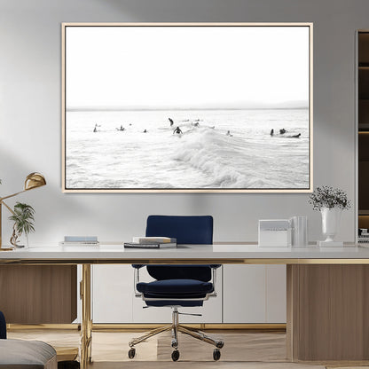 Monochrome photo of surfers riding and waiting on ocean waves, ideal for surf-themed or coastal energy wall decor.