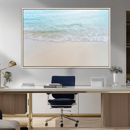 Soft shoreline with gentle aqua waves on smooth sand, ideal for minimalist coastal or pastel ocean-inspired home wall decor.
