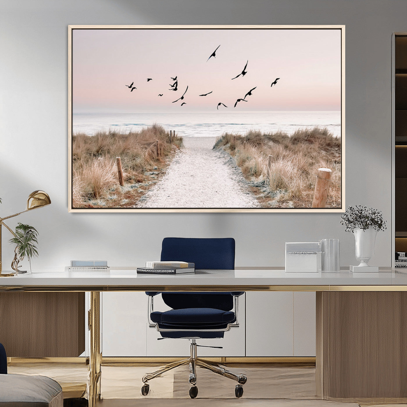 A peaceful coastal pathway leading to the ocean, with birds flying across a soft pastel sky, creating a calm and scenic beach atmosphere.