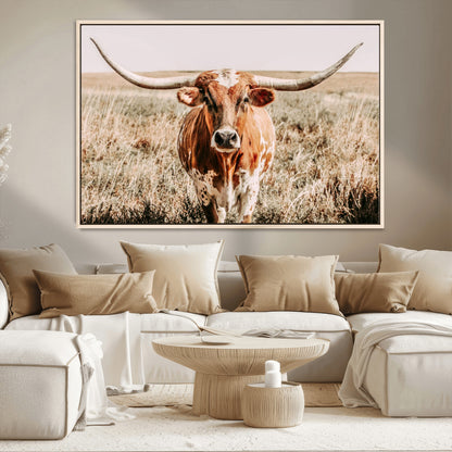 Framed longhorn cow canvas wall art with rustic prairie background, western animal print perfect for farmhouse or ranch style decor