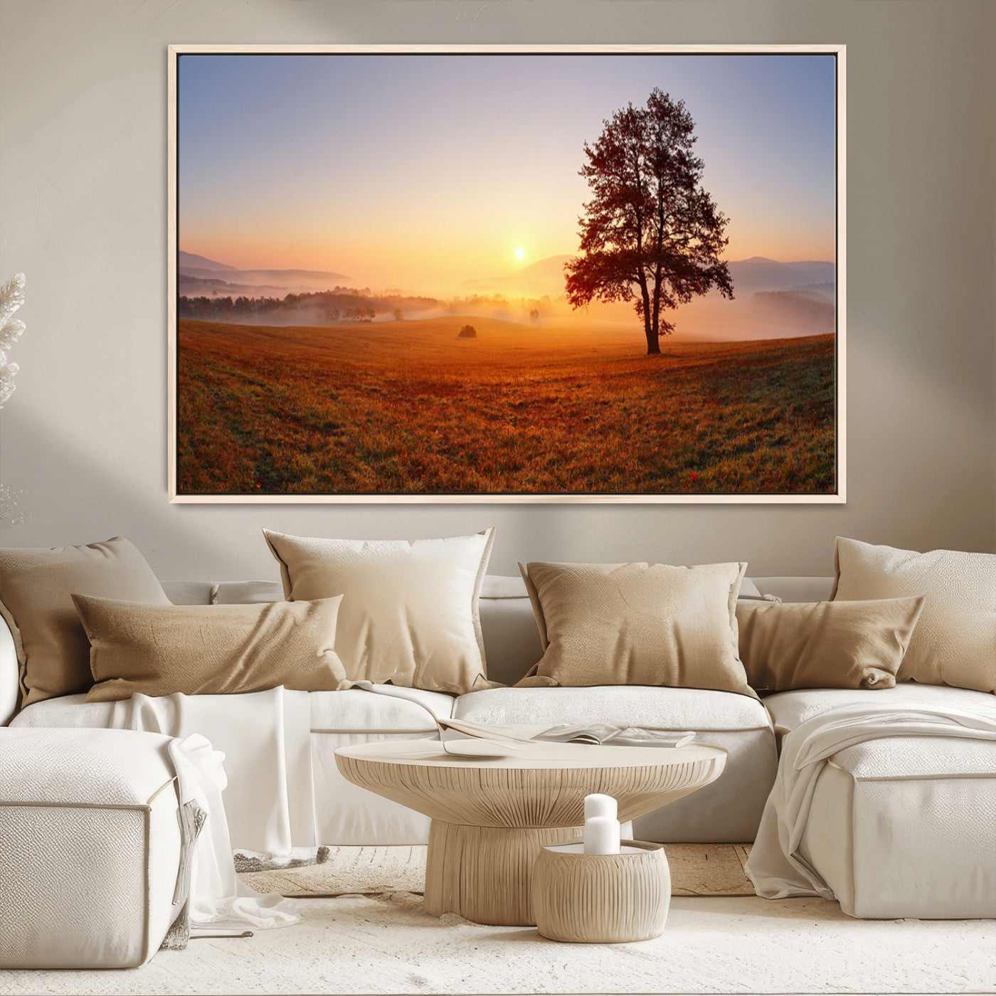 A tranquil landscape at sunrise with a mist-covered field and a lone tree, creating a peaceful and natural atmosphere.