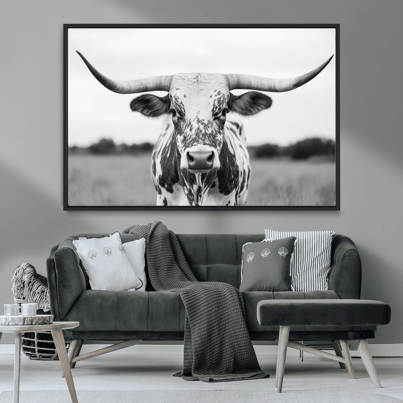 Capture the strength and elegance of nature with this striking black and white portrait of a longhorn cow. Its powerful presence makes a bold statement in any room.