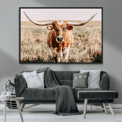 Framed longhorn cow canvas wall art with rustic prairie background, western animal print perfect for farmhouse or ranch style decor