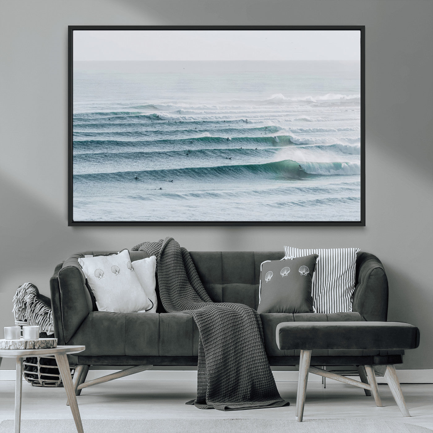 High-angle view of surfers lining up across layered ocean waves, ideal for minimal coastal or surf-inspired room decor.
