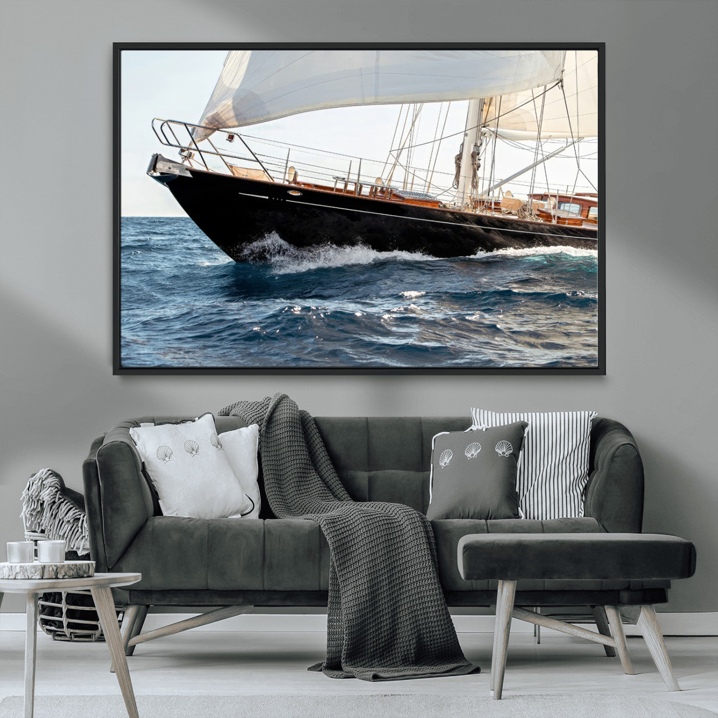 Close-up of a classic sailing yacht with wooden deck and full sails, perfect for nautical or coastal-style decor in ocean-themed spaces.